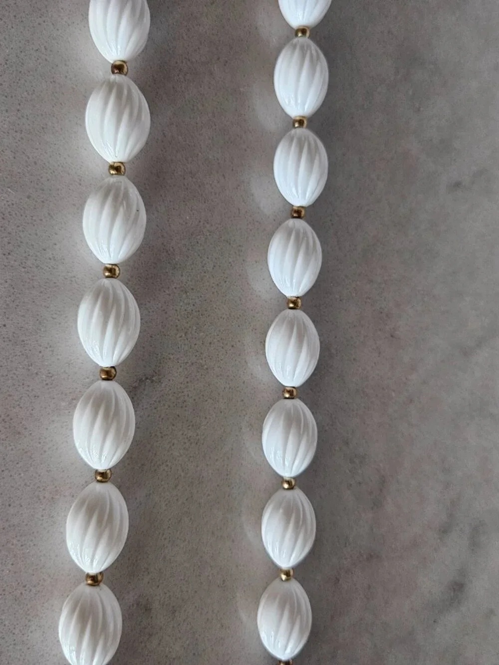 RARE AND VINTAGE WHITE RIBBED OVAL BEAD 48